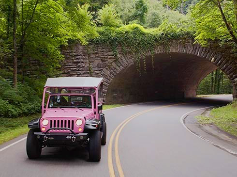 Pink® Jeep® Tour vehicle exiting Newfound Gap Tunnel, Great Smoky Mountains National Park