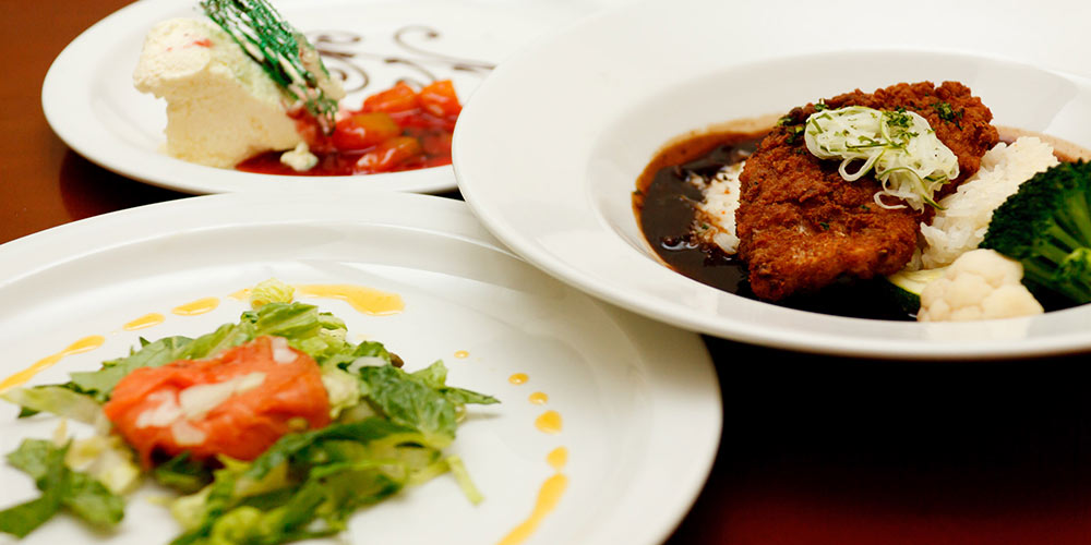 Close-up of plated three-course dinner representing Las Vegas dining options.