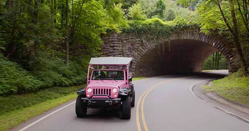 Pink® Jeep® Tour vehicle exiting Newfound Gap Tunnel, Great Smoky Mountains National Park