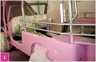 Close-up of Pink® Jeep® frame after being painted with the company's custom pink color.