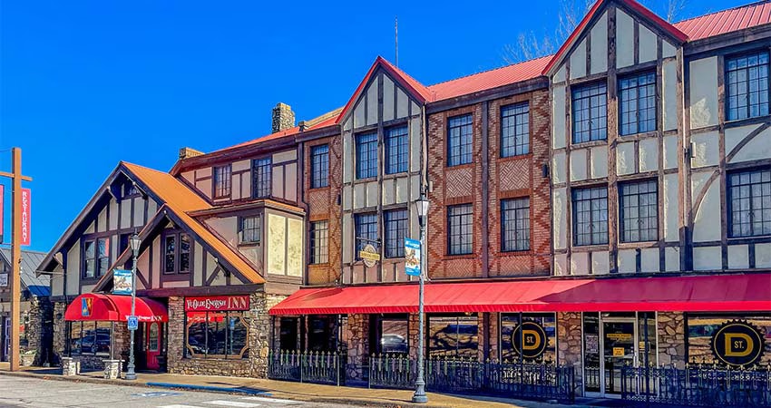 Old English style buildings along Historic Downing Street in Hollister, MO.