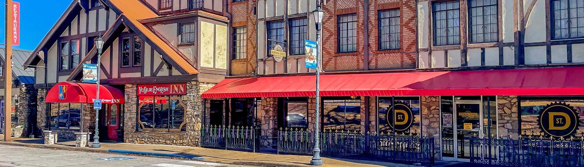 English Village styled buildings along Historic Downing Street in Downtown Hollister, MO.