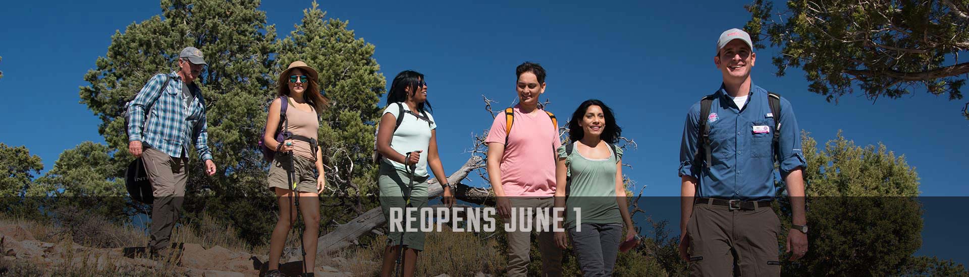 Pink® Jeep® Tours guide and guests hiking the Hermits Rest Trail, Grand Canyon. Reopens June 1 header image.